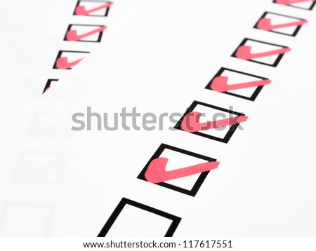 Check list with red pen marking