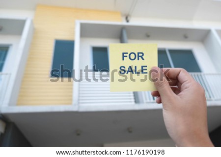House with message FOR SALE