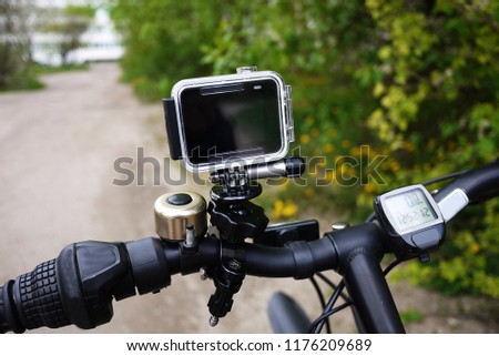 Action camera to capture your videos. Suitable for car travel, sports, diving, Cycling and other Hiking