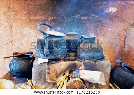 Traditional earthenware and oven in Cusco, Peru for making herbal hot tea