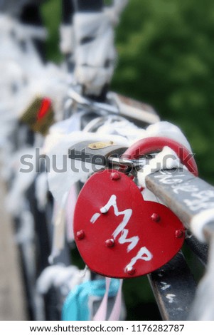 Metal color lock on the bridge - love forever