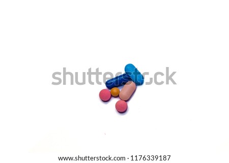 Colorful pills on white background. Medications in the form of tablets for oral use.