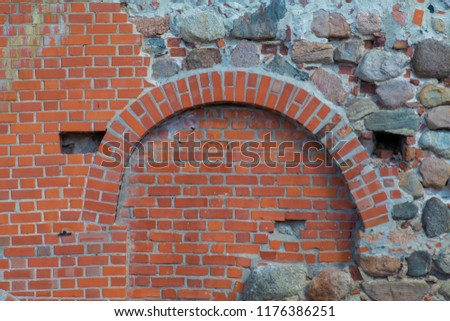 Background for design texture of a vintage brick and stone wall
