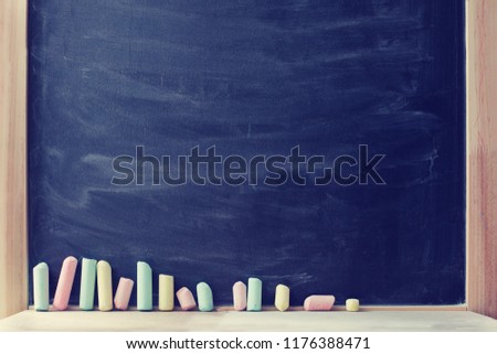 back to school concept background with chalk board 