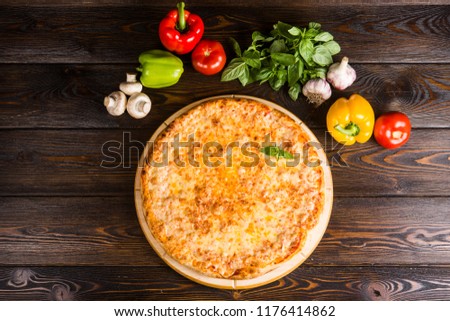 Italian pizza. Creative author's pizza with with 4 cheese Royalty-Free Stock Photo #1176414862
