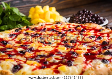 Fruit sweet pizza. Pizza for dessert. 
Pizza with sweet berries
