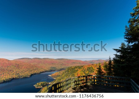 This is a picture of autumn leaves seen from the National Park "Mont-Tremblant" in the Laurentian Plateau in Quebec, Canada. This is a picture taken from the observation stand of the trail course # 3 