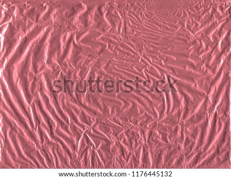 Shiny red  gold wrapping paper foil texture for wallpaper decoration element background, stock photo image