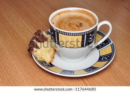 Coffe cup with cookie