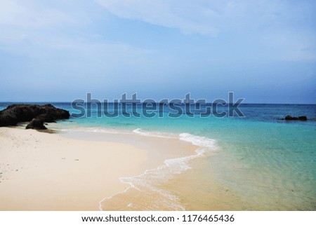 Tropical white sand beach arainst blue sky. Similan islands, Thailand, Phuket, Relaxing and romantic sunset beach scene for background and summer vacation