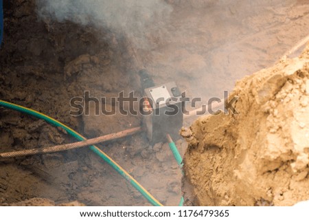 Welding copper ground wire on ground rod.Welding copper ground wire.Connect copper grounding lightning protection system. With the melting