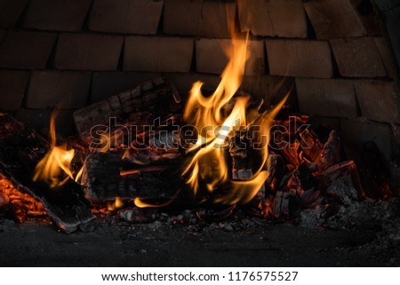 Wooden fire burning in a furnace, preparing for baking