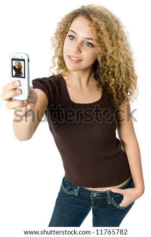 A beautiful young women taking a picture of herself with her mobile