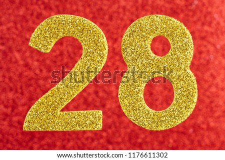 Number twenty-eight golden color over a red background. Anniversary. Horizontal