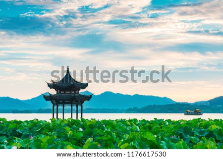 Jixian pavilion in hangzhou during sunset.the chinese word in photo means"Jixian pavilion".chinese ancient pavilion on the west lake in hangzhou.West Lake   of the most famous scenic spots in China.