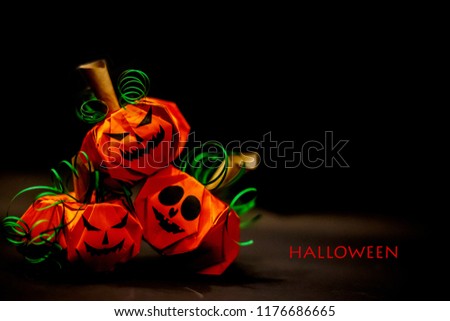 Halloween Pumpkins On black background, the orange Pumpkin paper, Halloween concepts, Happy Halloween Days, Copy space.