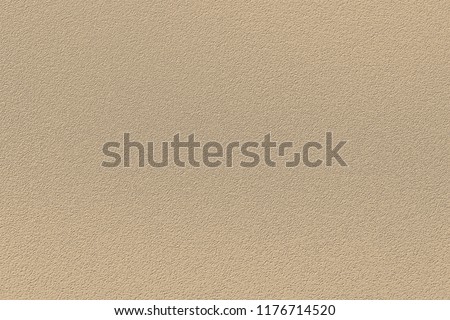 Texture of colored porous rubber. Fashionable color of autumn-winter 2018-2019 season: Almond Buff Pantone. Can be used as a background or mock up