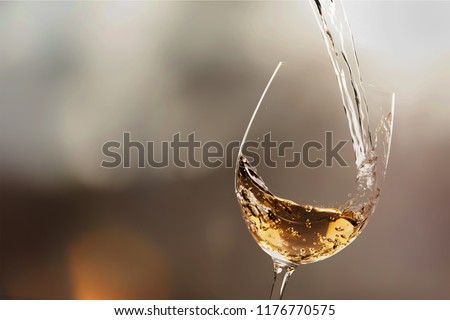 White wine splash isolated on background