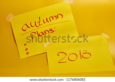 Autumn is written on paper
