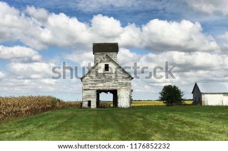 Vintage white barn rural landscape. 