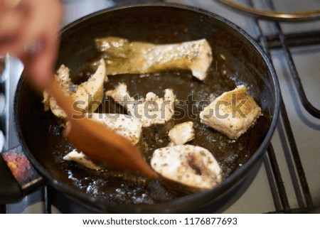 Fish frying Pike in a frying pan