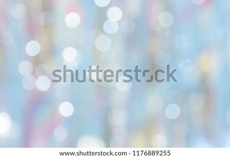 Abstract blurred bokeh on on blue pastel background