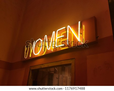 neon women sign