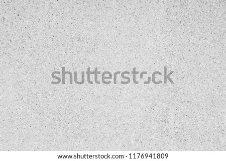 Washed sand texture and background. Wall made from fine and coarse sand washing mix with cement mortar. Stone wall fence background. Royalty-Free Stock Photo #1176941809
