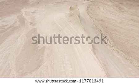 canyon in the desert, white mountains, soil erosion