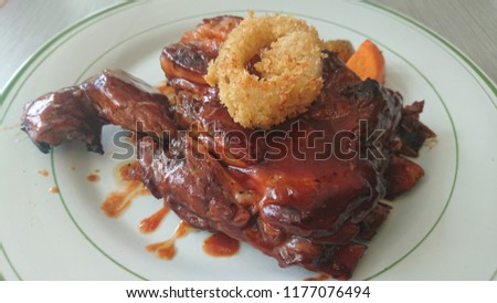 Close up shot of a baby back ribs meal 