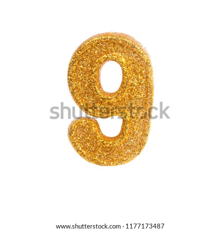 photo of golden decorative number isolated on the white