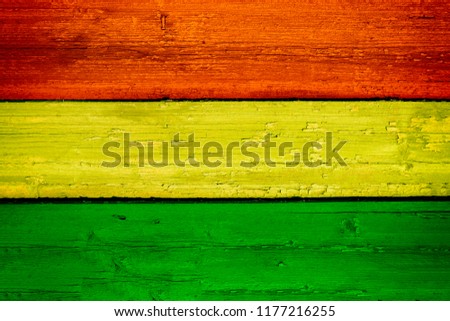 Bolivia National Flag on a Wooden Background. Grungy Texture of Flags.