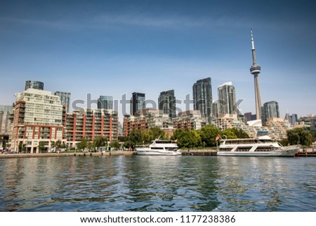 Downtown city view of Toronto Canada from Queens Quay and Lake Ontario