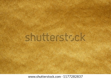 Paper gold sheet abstract background texture and elegant for Merry christmas and Happy new year Royalty-Free Stock Photo #1177282837