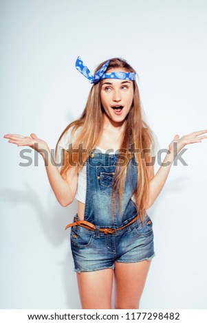 young pretty stylish brunette hipster girl posing emotional isol