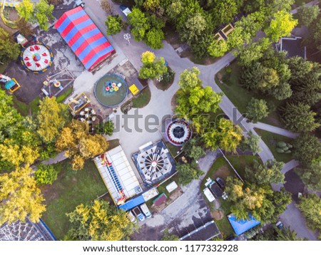 city amusement park aerial top view. park with various attractions. drone photography