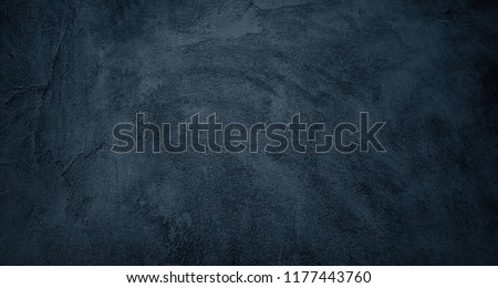 Beautiful Abstract Grunge Decorative Black Wall Background. Art Rough Dark Texture Web Banner With Space For Text. Textured background with bright center spotlight