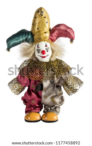 Porcelain Court Jester Clown Doll with a big smile on a white background.