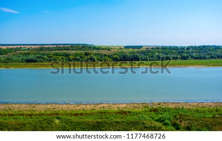 Photo of big beautiful river in Khotyn, view from beach