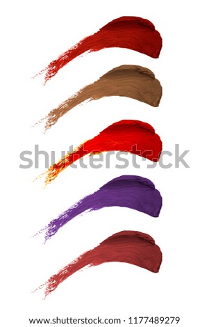Multiple colors of lipstick or cosmetic smears on a white background. This fashion product  can also depict nail polish tones.  The product is swiped to show the texture close up. 