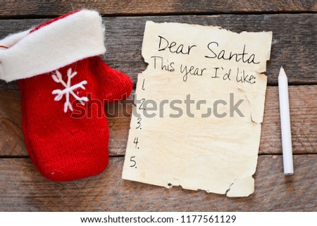 Dear Santa. Letter to Santa Claus with copyspace at decorated Christmas background.