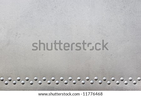 silver metal with rivets