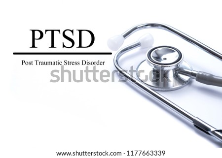 Page with PTSD - post traumatic stress disorder. War veteran mental health issue on the table with stethoscope, medical concept.