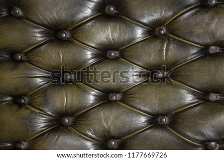 Luxury couch / sofa leather textured background.