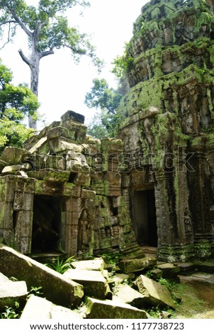 Abandoned murky mossy ancient hindu temple ruins in Cambodia