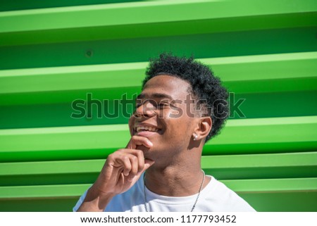 Young man making face expressions