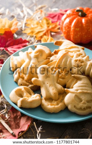 Homemade Halloween cookies on wooden table

