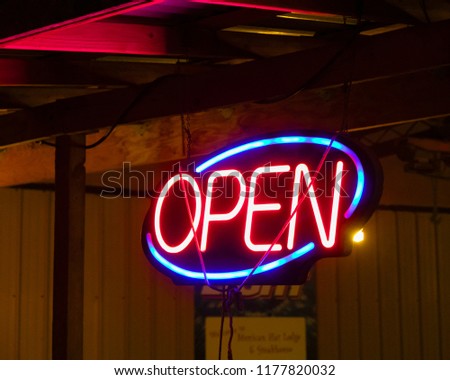 Neon sign outside of a restaurant in Mexican Hat