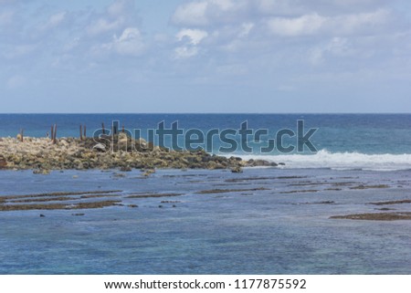 Beautiful scenic coastline of the Melasti beach with blue sky, Bali, Indonesia