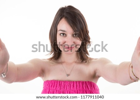young brunette girl make a selfie in white background